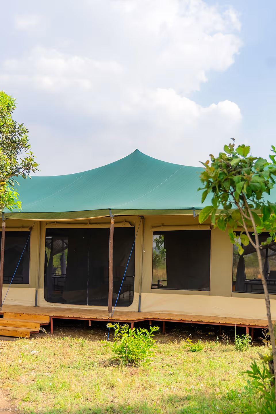 Family Tented Room: the bed, canvas walls and the view from the veranda