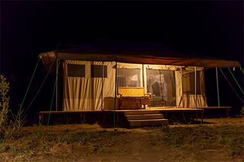 The veranda of a tent looking out over the plains